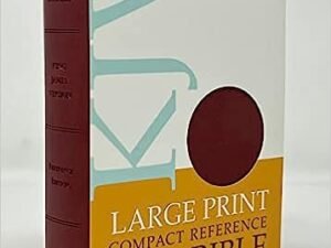 Close-up of compact KJV reference Bible with burgundy imitation leather cover.