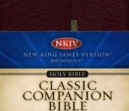 NKJV Burgundy Checkbook Bible in red letter edition, burgundy leather cover and snap flap design.