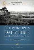 NKJV Charles Stanley Life Principles Daily Bible, a black letter edition.