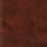 Close-up of a chestnut ESV Single Column Journaling Bible with leaves design