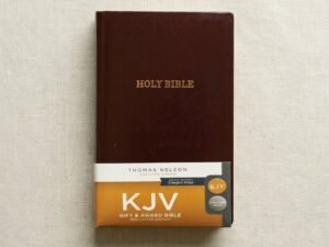 Hardcover Book / Bible — Flat Lay Composition | Generated by Modelize