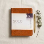 New Testament Devotional — Top-Down Flat Lay | Generated by Modelize